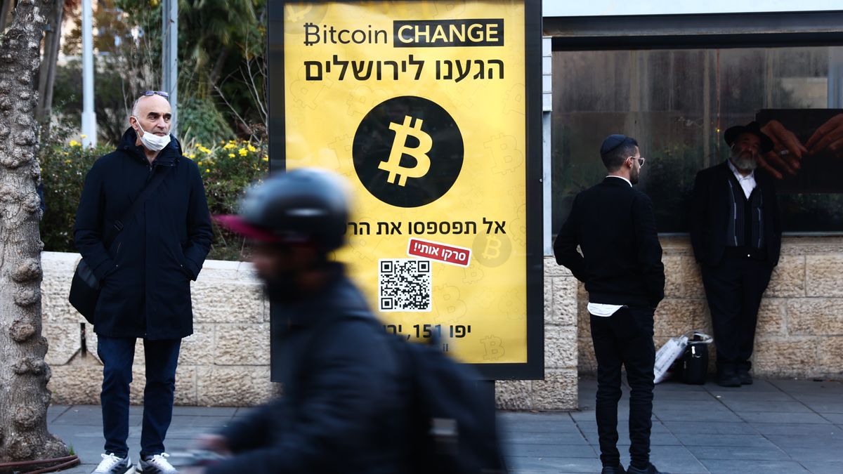 Bitcoin Change poster is seen near a bus stop in Jerusalem, Israel on December 29, 2022. (Photo by Jakub Porzycki/NurPhoto via Getty Images)