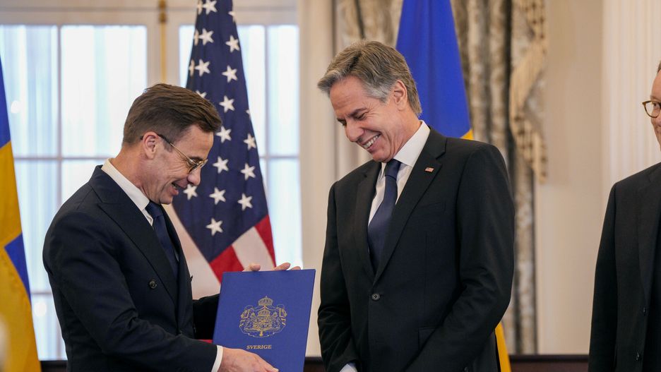 Temporary
Secretary of State Antony Blinken, right, stands with Swedish Prime Minister Ulf Kristersson before presenting Sweden's NATO Instruments of Accession in the Benjamin Franklin Room at the State Department, Thursday, March 7, 2024, in Washington. (AP Photo/Jess Rapfogel)
Jess Rapfogel