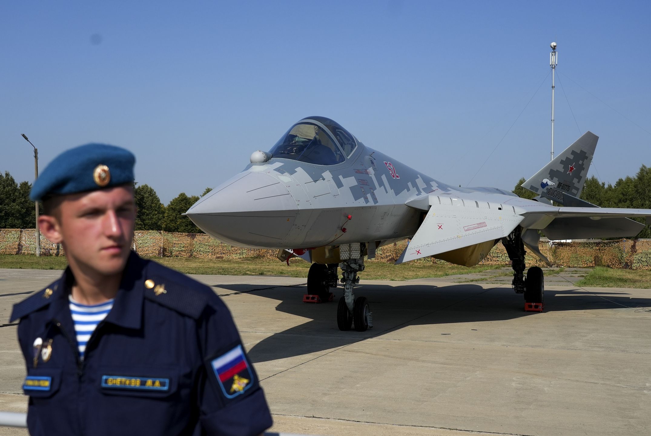 MOSCOW, RUSSIA - AUGUST 17: A soldier is seen in front of the a Sukhoi Su-57 aircraft during the International Military-Technical Forum "Army 2022" at Kubinka military training ground in Moscow, Russia on August 17, 2022. (Photo by Pavel Pavlov/Anadolu Agency via Getty Images)