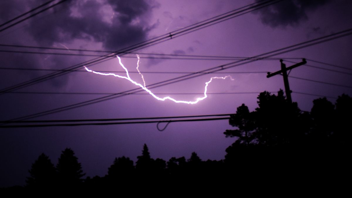 Lightning fills the sky past power lines on Monday, July 29, 2019 from Duanesburg, N.Y. (Photo by Lori Van Buren/Albany Times Union via Getty Images)