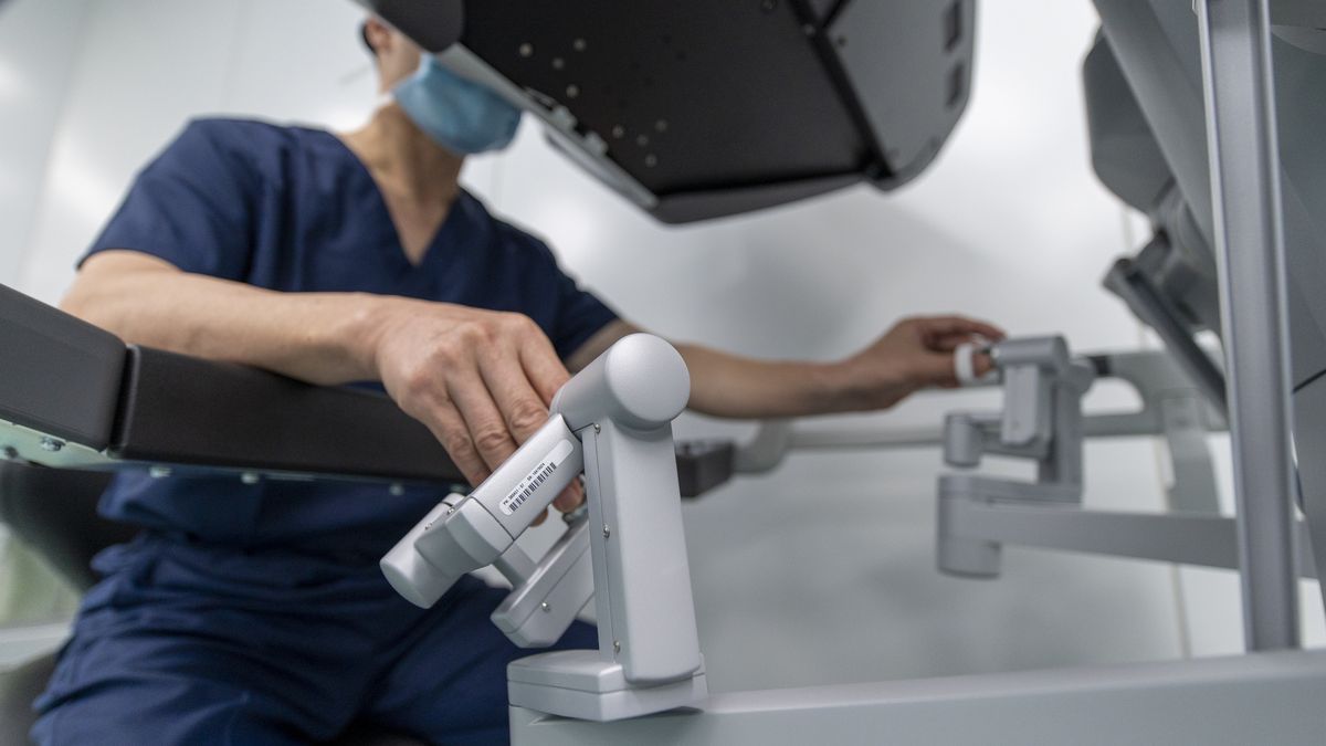 JINHUA, CHINA - OCTOBER 10: Surgeons perform a minimally invasive surgery with the assistance of the Da Vinci surgical robot on an 80-year-old patient with rectal cancer at a hospital on October 10, 2024 in Jinhua, Zhejiang Province of China. (Photo by Hu Xiaofei/VCG via Getty Images)