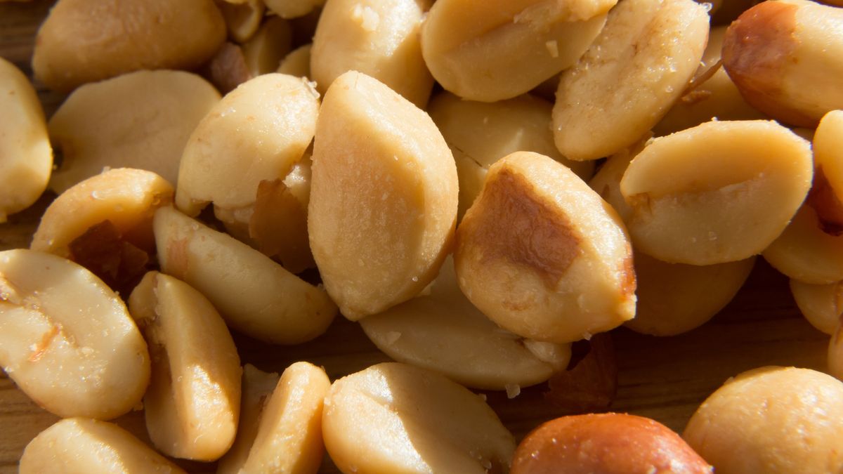 A close up shot of peanuts.A close up shot of peanuts. This image can be used to represent snacking or peanut allergies.Matthew de Langecloseup, dish, isolated, vegetarian, photo, natural, delicious, salt, peanut, macro, eat, tasty, healthy, up, texture, close, cuisine, plants, beautiful, background, health, nutrition, image, nut, raw, food wallpaper, restaurant decor, bar snacks, food background, peanut allergies