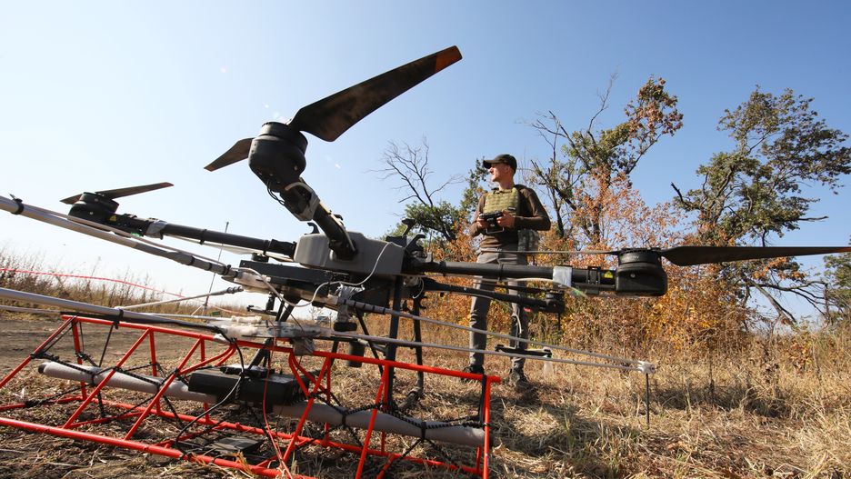 KHARKIV REGION, UKRAINE - OCTOBER 01, 2023 - Representatives of the Postup NGO inspect a mined area with a drone as part of demining works, Kharkiv Region, north-eastern Ukraine. (Photo credit should read Vyacheslav Madiyevskyi / Ukrinform/Future Publishing via Getty Images)