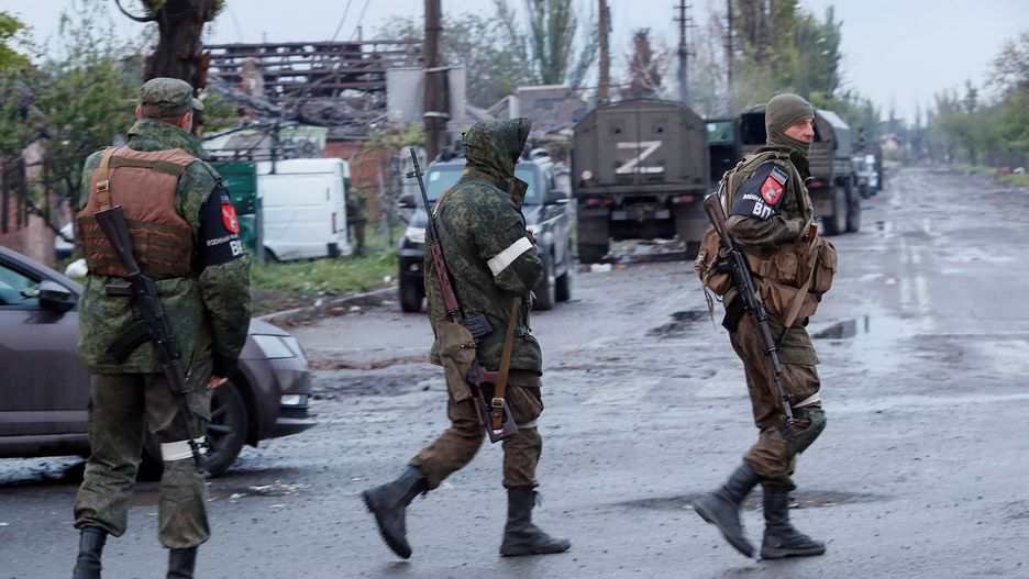 Service members of pro-Russian troops walk in Mariupol
Service members of pro-Russian troops walk across a road before the expected departure of Ukrainian soldiers, who surrendered at the besieged Azovstal steel mill, in the course of Ukraine-Russia conflict in Mariupol, Ukraine May 19, 2022.,Image: 692813261, License: Rights-managed, Restrictions: , Model Release: no, Credit line: ALEXANDER ERMOCHENKO / Reuters / Forum
ALEXANDER ERMOCHENKO / Reuters /
defence, civil unrest, war, category_code_def, category_code_europ, category_code_war, category_code_vio, category_code_defence, category_code_civil unrest