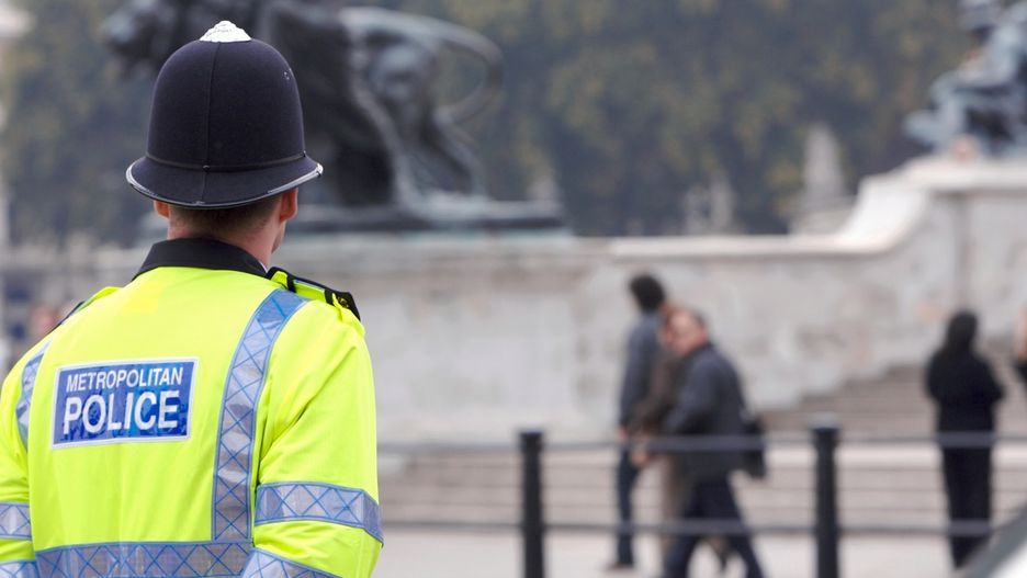 A British cop standing guard at Buckingham Palace
A British police man stands on duty across the road from Buckingham Palace, as tourists pass by in the background on their way to see the Changing of the Guard.
RFStock
Service, Tourism, Emergency Services, A Helping Hand, Men, Copy Space, Community, Fluorescent, Civil Servant, Surveillance, Reflective Clothing, Buckingham Palace, Greater London, London - England, Watching, Law, Spectator, Hat, Control, Assistance, Security, Yellow, Blue, English Culture, British Culture, Crime, Selective Focus, Police Force, Tourist, England, UK, Jacket, Work Helmet, Protective Workwear, Uniform, Metropolitan Police, Law Enforcement And Crime, Industry