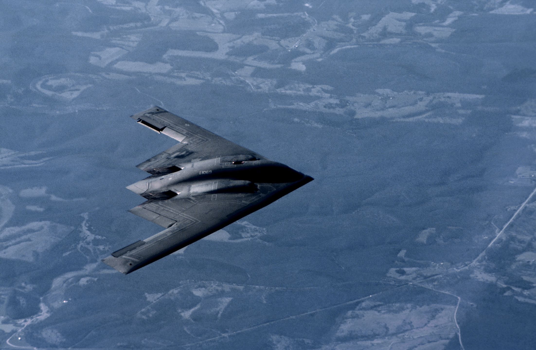 B2 Stealth Mid-Air Refueling with KC-10A Tanker
A KC-10A Tanker from McGuire Air Force Base, New Jersey refuels the Northrop B-2 Stealth Bomber over the Midwestern U.S. on March 27, 2001. The Northrop B-2 Stealth Bomber is a low-observable, strategic, long-range, heavy bomber capable of penetrating sophisticated and dense air-defence shields. Photo by Gary Ell
Gary Ell
aircraft, b-2, defence, defense, munitions