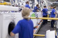 Washing Machine Manufacture At Electrolux AB Polish Plant
Employees work on the assembly of domestic washing machines on the production line at the Electrolux AB factory in Olawa, Poland, on Tuesday, Oct. 16, 2012. Electrolux AB is the world's second largest maker of appliances such as refrigerators, washers, vacuum cleaners, cookers and air-conditioners under AEG, Eureka, Frigidaire and Electrolux brands. Photographer: Bartek Sadowski/Bloomberg via Getty Images
Bloomberg
EMEA; EUROPE, EMEA; EASTERN EUROPE, ECONOMY; ECONOMIC; ECO, INDUSTRY: INDUSTRIAL; FACTORY;, INDUSTRY: INDUSTRIAL, MANUFACTURE; MANUFACTURING, JOB; JOBS; EMPLOYMENT, LABOR; LABORER; WORKER