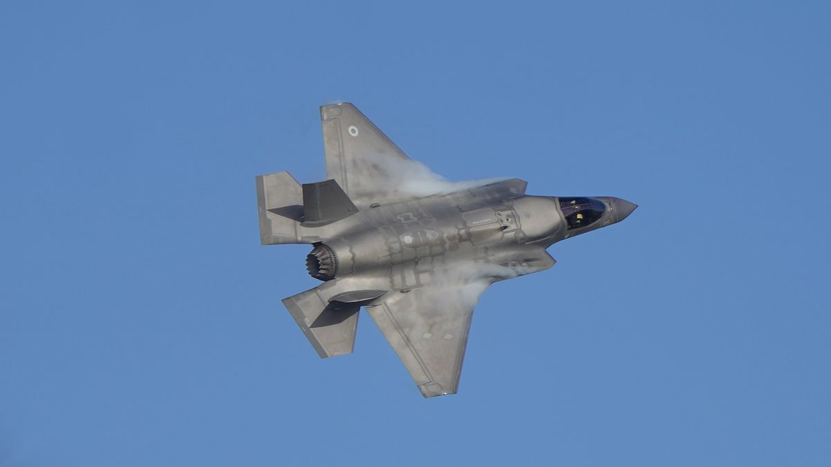 An F-35 Lightning stealth jet performs a flypast during the commissioning ceremony for 809 Naval Air Squadron at RAF Marham in King's Lynn in Norfolk. 809 Naval Air Squadron the second frontline squadron to be stood up to fly the RAF's F-35 Lightning stealth fighter jets. The squadron was originally formed in 1941 and most recently operated in 1982, flying during the Falklands War before the squadron was decommissioned in December of that year. Picture date: Friday December 8, 2023. (Photo by Joe Giddens/PA Images via Getty Images)
