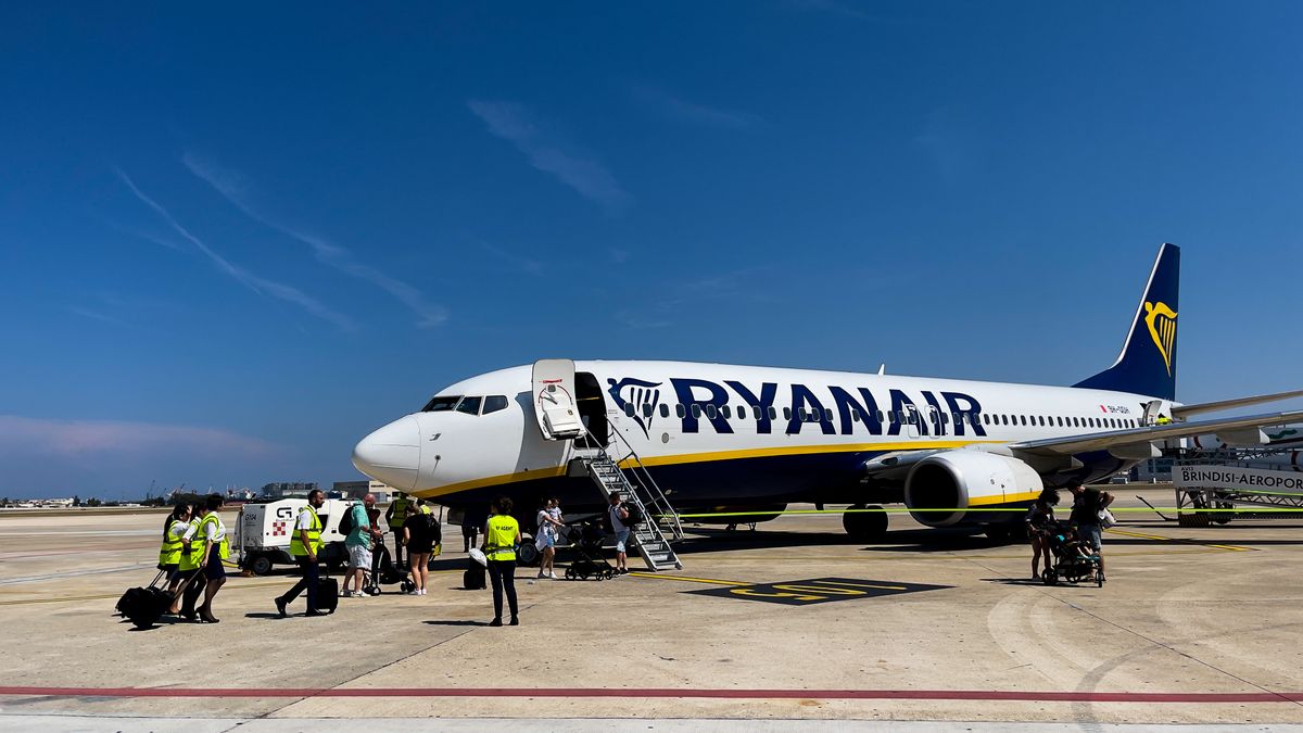 People deplane from a a Ryanair Boeing 737-800 landed in Brindisi, Italy, on June 14, 2022. (Photo by Manuel Romano/NurPhoto via Getty Images)