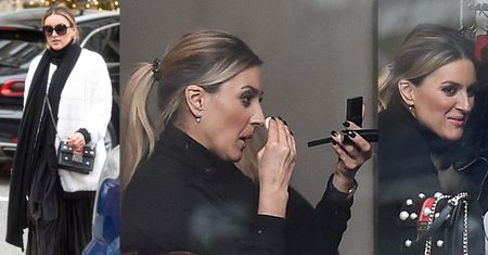 Samotna Karolina Szostak maluje się w witrynie restauracji (ZDJĘCIA)
