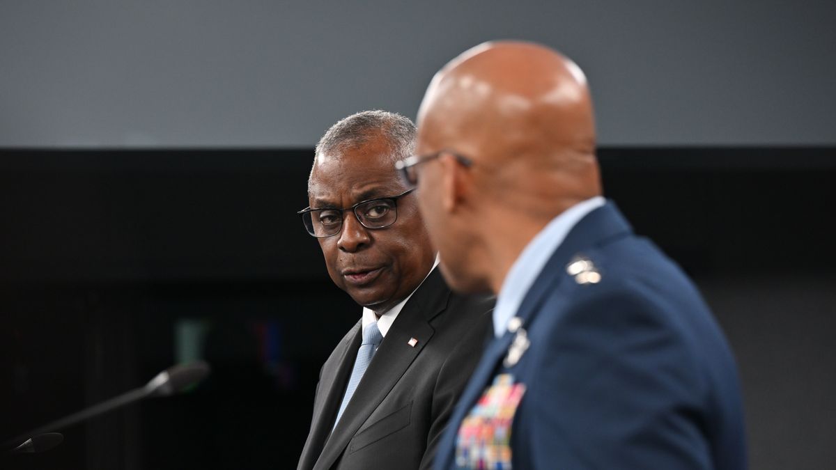 ARLINGTON, VA- MAY 20: Lloyd Austin, United States Secretary of Defense, left, and General Charles Q. Brown, Jr., USAF Chairman of the Joint Chiefs of Staff, speak during a press conference at the Pentagon on May 20, 2024 in Arlington, Va. (Photo by Ricky Carioti/The Washington Post via Getty Images)