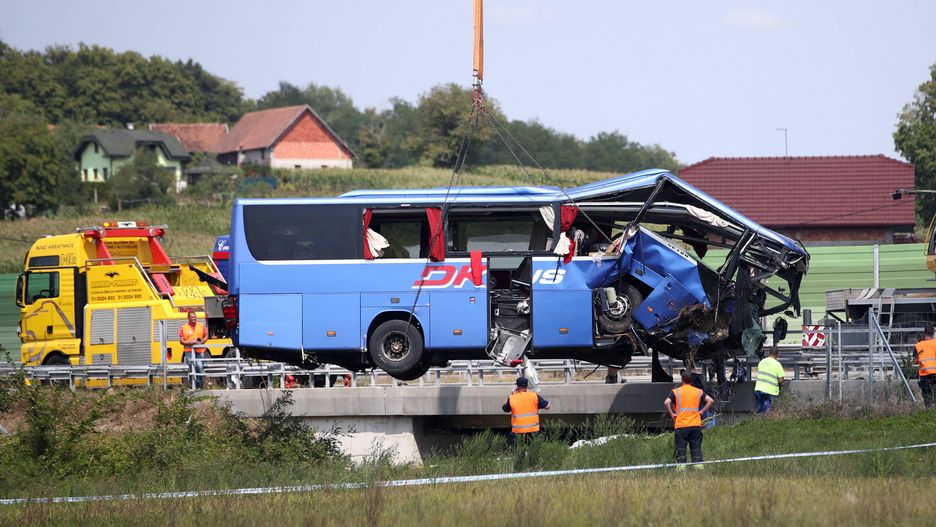 Polish bus crash in Croatia
A crane works on removing the bus with Polish licence plates that slipped off a road, from the scene near Varazdin, northwestern Croatia, August 6, 2022. At least 12 people died and 31 injured after a Polish bus filled with religious pilgrims skidded off a highway in northern Croatia early on Saturday morning. 18 people among the 31 hurt have suffered serious injuries after the bus crashed off the A4 highway in Podvorec, about 30 miles (50km) north of capital Zagreb. Photo: Zeljko Lukunic/PIXSELL 
Dostawca: PAP/PIXSELL
Zeljko Lukunic/PIXSELL
accident, bus, emergency, police