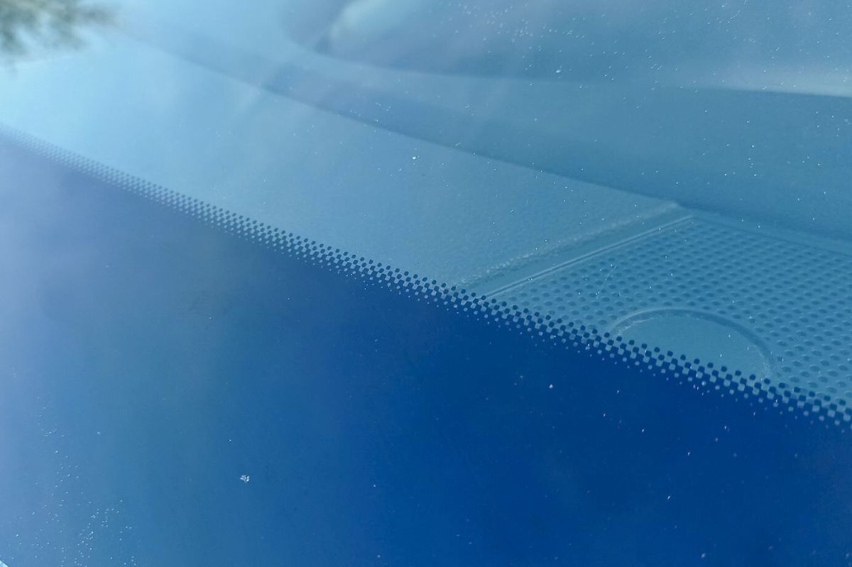 Why do your car windows have mysterious black dots