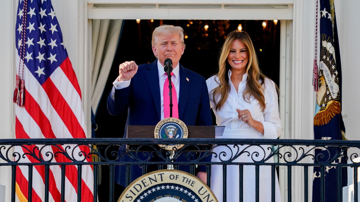 US President Donald Trump, left, and First Lady Melania Trump during a signing ceremony for the One Big Beautiful Bill Act on the South Lawn of the White House in Washington, DC, US, on Friday, July 4, 2025. Trump signed his $3.4 trillion budget bill into law Friday, enshrining an extension of tax cuts, temporary new breaks for tipped workers and funding to crack down on illegal immigration. Photographer: Kent Nishimura/Bloomberg via Getty Images