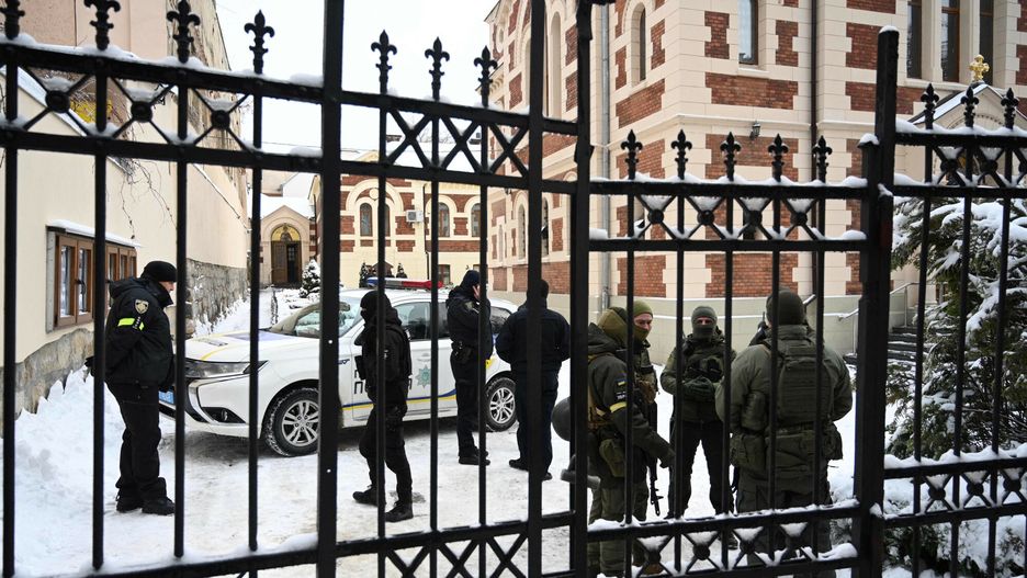 Temporary
Ukraine's security service officers secure the St. George Cathedral during a search operation of the premises of religious sites in the western Ukrainian city of Lviv on December 14, 2022. - Ukraine's SBU security service said on December 14, 2022, it carried out "counter-intelligence" measures in churches and monasteries across the country in its most recent descent on religious sites of the Russia-linked Ukrainian Orthodox Church. (Photo by YURIY DYACHYSHYN / AFP)
YURIY DYACHYSHYN
