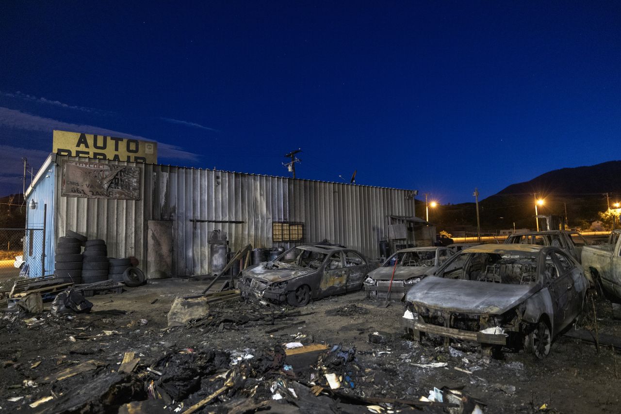 GORMAN, CALIFORNIA - JUNE 17: Dozens of burned up cars that were destroyed by the Post Fire at an auto repair business are seen on June 17, 2024 in Gorman, California. Strong dry winds are forecast to continue prolonging a heightened danger that the 15,000-acre Post Fire, which is 20 percent contained, could blow embers over and beyond firefighters to threaten suburban neighborhoods near Castaic, California. The Post Fire is an early season wildfire, the largest fire in the state so far this year, and is burning days before the start of summer. (Photo by David McNew/Getty Images)