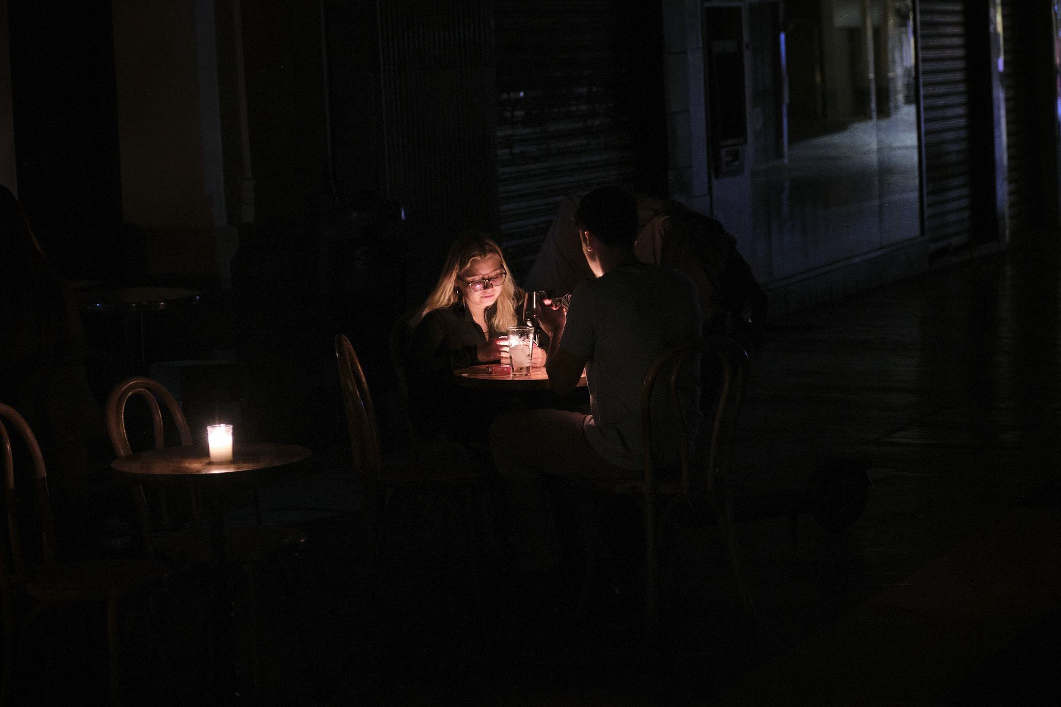 A massive power outage strikes Spain and Portugal, briefly affecting parts of France as well, on Monday, April 28, 2025. Street lights, traffic signals, and internet/mobile networks go down, leading to widespread disruptions and long queues at ATMs and grocery stores. Authorities declare a state of emergency in several Spanish regions and mobilize 30,000 police officers to maintain order. The blackout, one of the largest in Europe's recent history, sparks debate about grid stability and the role of renewables in Spain's energy system in Malaga, Spain, on April 29, 2025. (Photo by Guillaume Pinon/NurPhoto via Getty Images)
