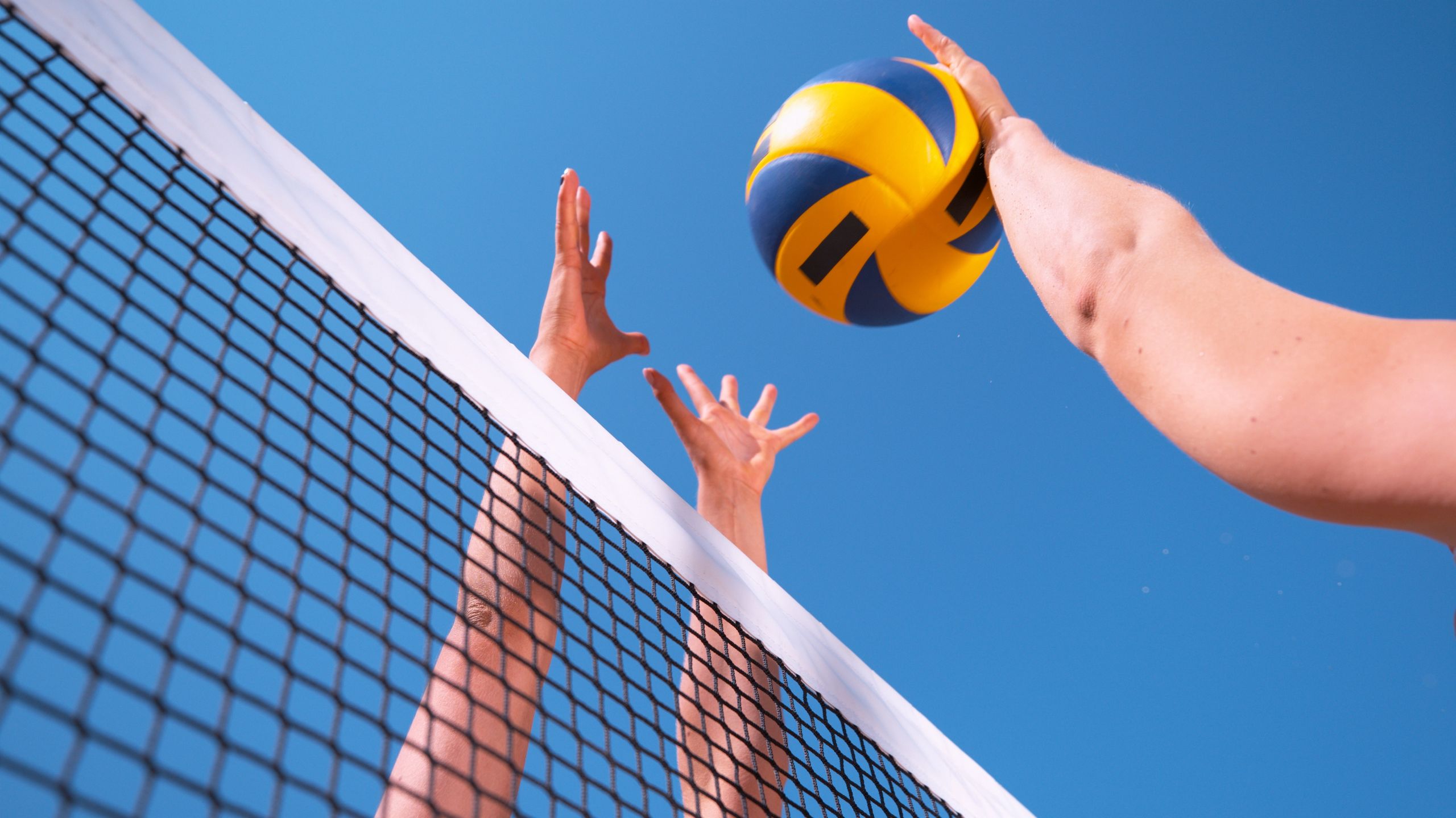 low angle, close up, volleyball, net, ball, spike, block, smash, hands, arms, sunny, blue, sky, action, sports, impact, recreation, women, girls, playing, unrecognizable, unknown, people, female, person, hit, strike, point, score, defense, athletes, players, sunshine, offense, opponent, competition, game, match, fun, summer, outdoors, beach volleyball, beach, holiday, vacation, active, healthy, lifestyle, training, exercise