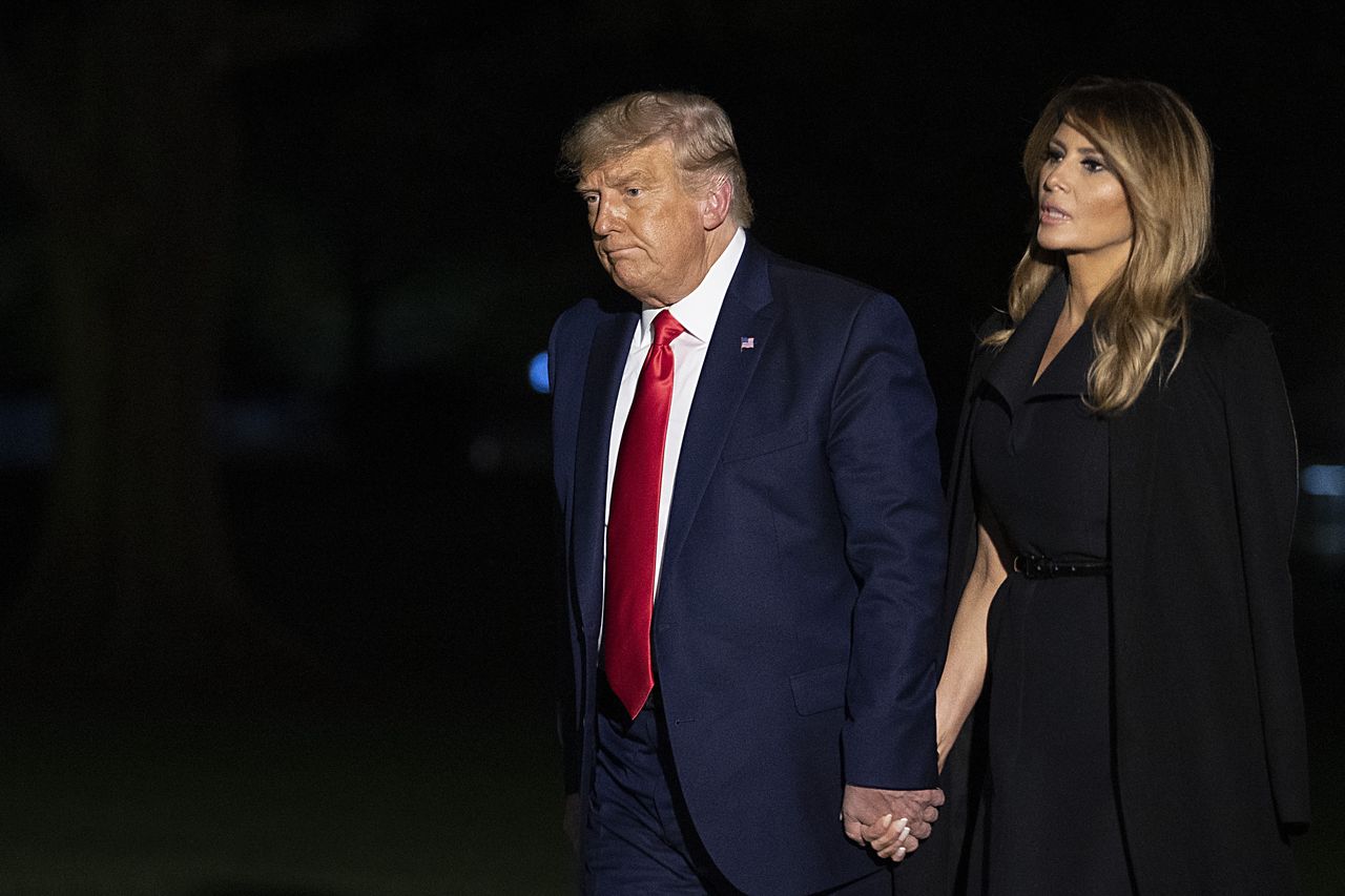 WASHINGTON, DC - OCTOBER 23: U.S. President Donald Trump and first lady Melania Trump walk on the south lawn of the White House on October 23, 2020 in Washington, DC. The Trumps were returning from Nashville, Tennessee where the final debate with Democratic presidential nominee Joe Biden took place. (Photo by Tasos Katopodis/Getty Images) (Photo by Tasos Katopodis/Getty Images)