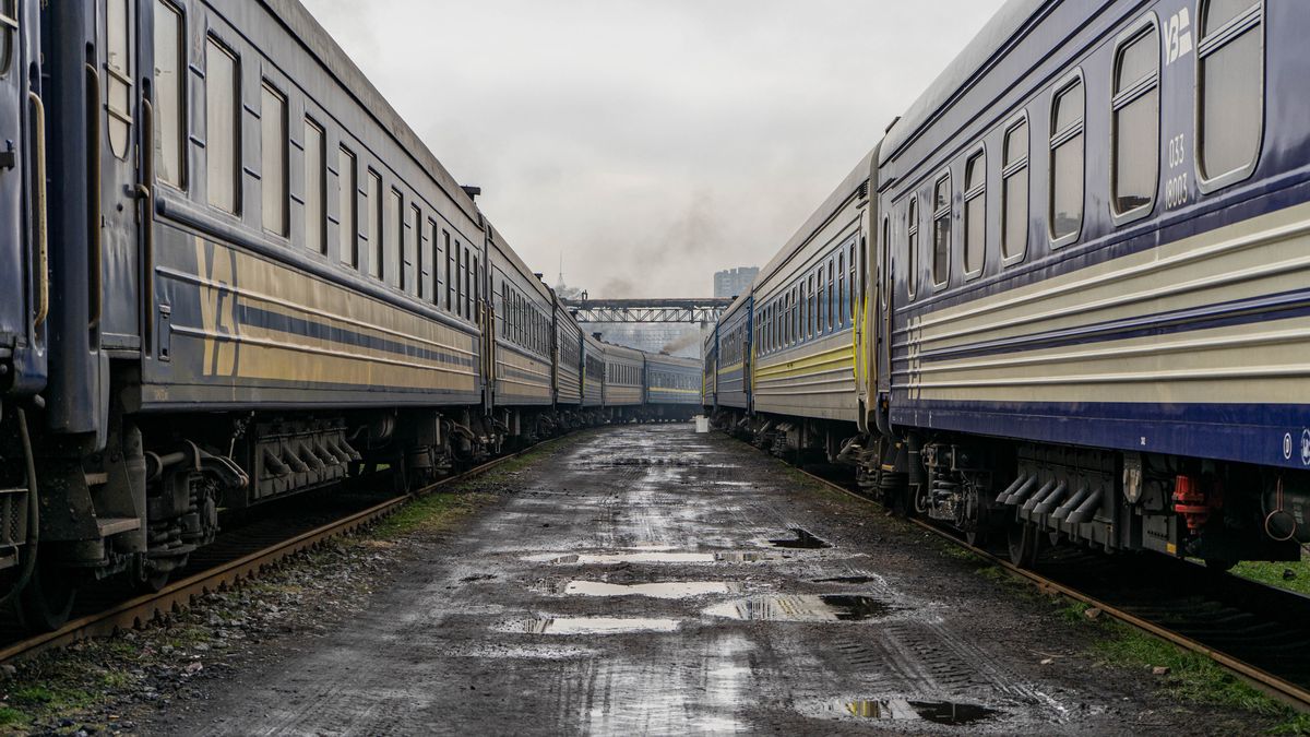 KYIV, UKRAINE - DECEMBER 26: Trains stand at a railway station depot on December 26, 2022 in Kyiv, Ukraine. Railway workers carry out duties in railway stations to ensure that Ukrainian trains reach their destination every day. Before the trains go to the central railway station to pick up passengers, they are washed, loaded with coal at the railway station depot, and workers fix any mechanical issues found. Since the beginning of Russia's full-scale invasion of Ukraine, Ukrainian railways "Ukrzaliznytsia" have evacuated more than 4 million people, one million children, 120 thousand animals, transported more than 200 diplomatic delegations and 300 thousand humanitarian cargoes. (Photo by Kateryna Mykhailova/Global Images Ukraine via Getty Images)