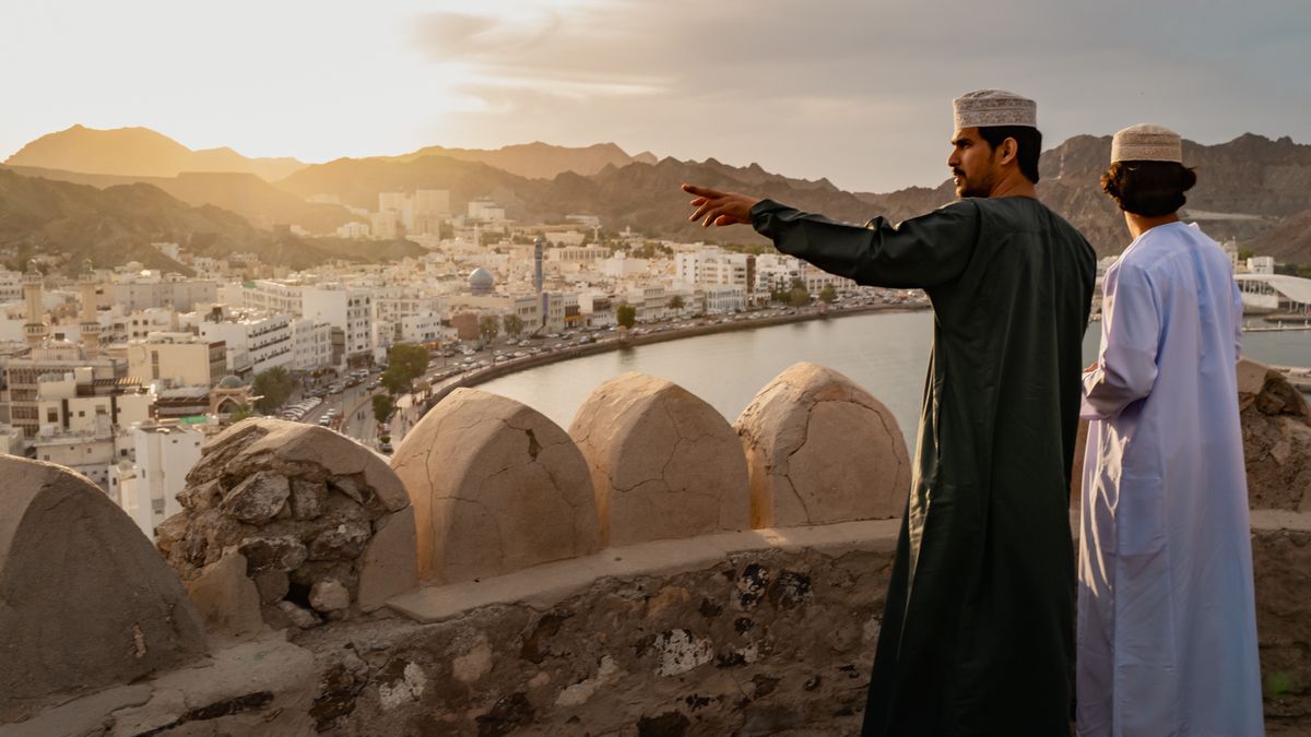 MUSCAT, OMAN - MARCH 30: Locals visit Muscat Anchorage near the Strait of Hormuz on March 30, 2026 in Muscat, Oman. Several Chinese-owned vessels were reportedly able to transit the Strait of Hormuz today, the day after U.S. President Donald Trump said Iran would allow 20 ships to cross through the vital waterway. Maritime traffic through the Strait of Hormuz, which conveys about a fifth of the world's oil and gas, has mostly come to a halt after the joint U.S.-Israeli war with Iran that began on February 28. (Photo by Elke Scholiers/Getty Images)