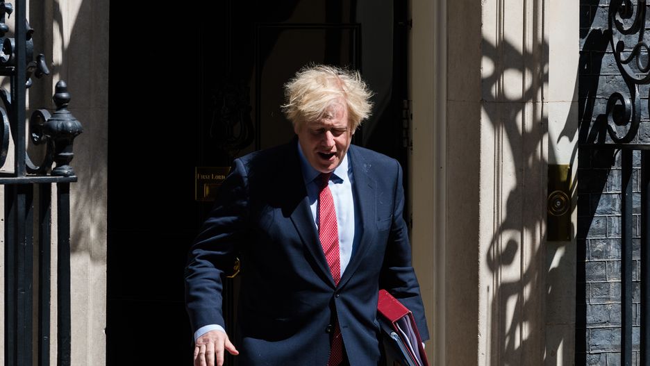 British Prime Minister Boris Johnson leaves 10 Downing Street for PMQs at the House of Commons on 20 May, 2020 in London, England. The UK remains in lockdown due to the coronavirus (Covid-19) pandemic with some of the restrictions eased across England last week as the number of fatalities and infection rates decline. (Photo by WIktor Szymanowicz/NurPhoto via Getty Images)