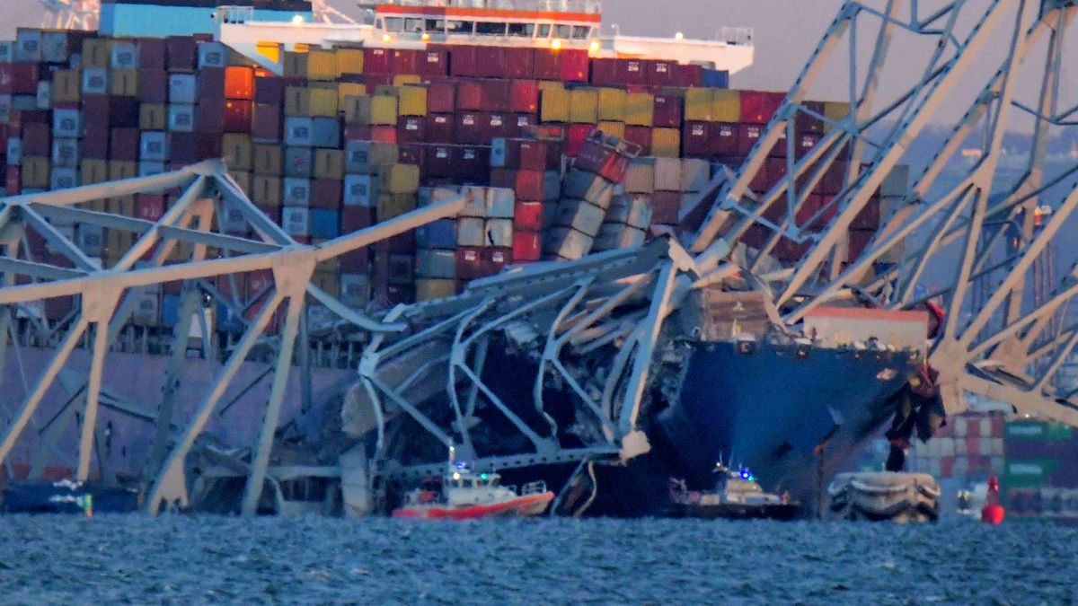 Emergency boats float around a container ship whose bow received damage after the Francis Scott Key Bridge crumbled onto the vessel and into the Patapsco River following the March 26 collision with the structure. (Karl Merton Ferron/The Baltimore Sun/Tribune News Service via Getty Images)