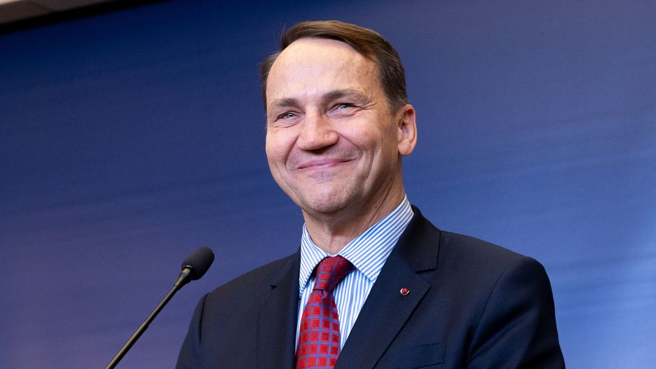 WARSAW, POLAND - 2024/10/23: Minister of Foreign Affairs of Poland Radoslaw Sikorski is smiling as he speaks to the media during a press conference. Press conference of the Minister of Foreign Affairs of Poland Radoslaw Sikorski and Minister of Foreign Affairs of Norway Espen Barth Eide. During a press conference, the ministers discussed support for Ukraine, including military and economic assistance and reconstruction plans. Security issues were also discussed, such as sanctions against Russia and Belarus, hybrid threats, disinformation and defense cooperation within The North Atlantic Treaty Organization (NATO). (Photo by Marek Antoni Iwanczuk/SOPA Images/LightRocket via Getty Images)