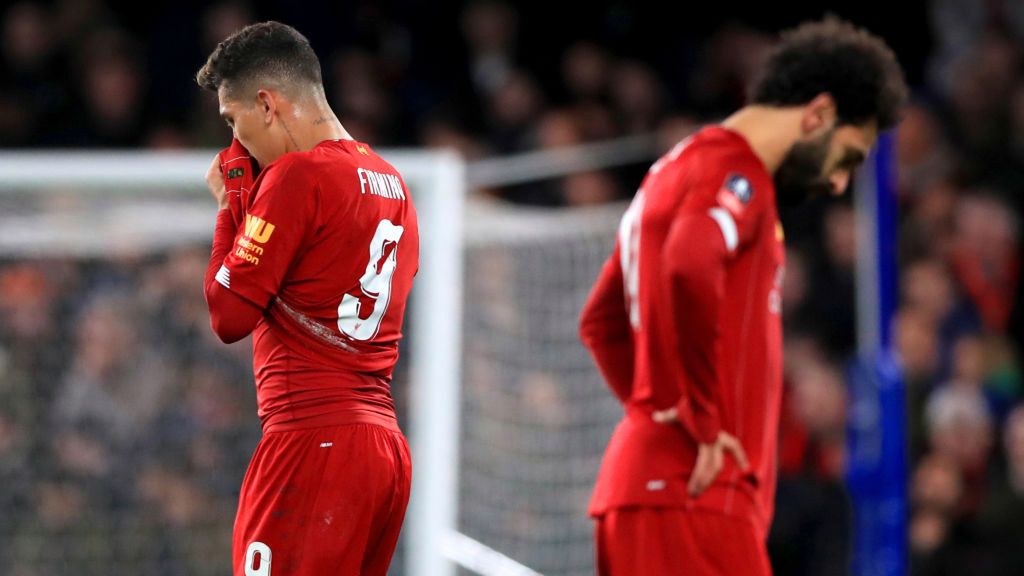 Getty Images / Na zdjęciu: Roberto Firmino (L) i Mohamed Salah (P)