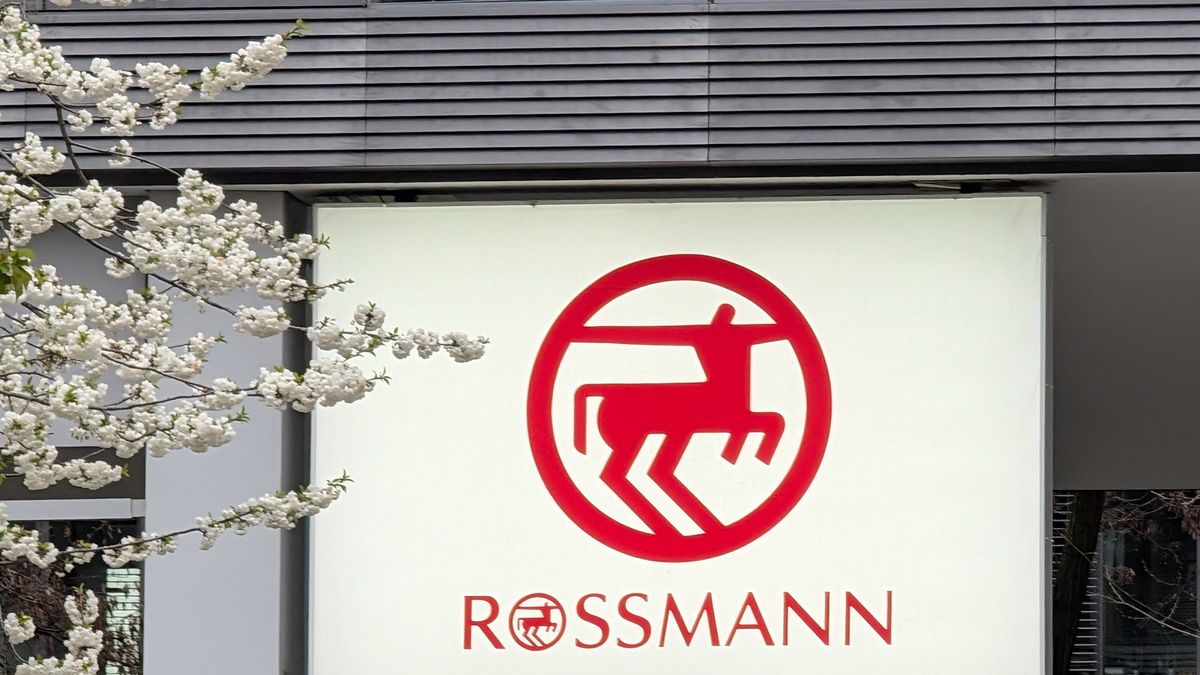 A Rossmann drugstore logo is displayed on a commercial building in Munich, Bavaria, Germany, on April 14, 2026. Dirk Rossmann GmbH, commonly referred to as Rossmann, is one of the largest drugstore chains in Europe. (Photo by Michael Nguyen/NurPhoto via Getty Images)