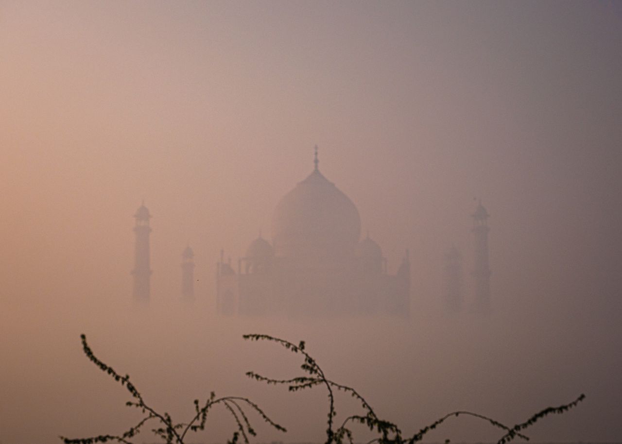 The Taj Mahal is barely visible.