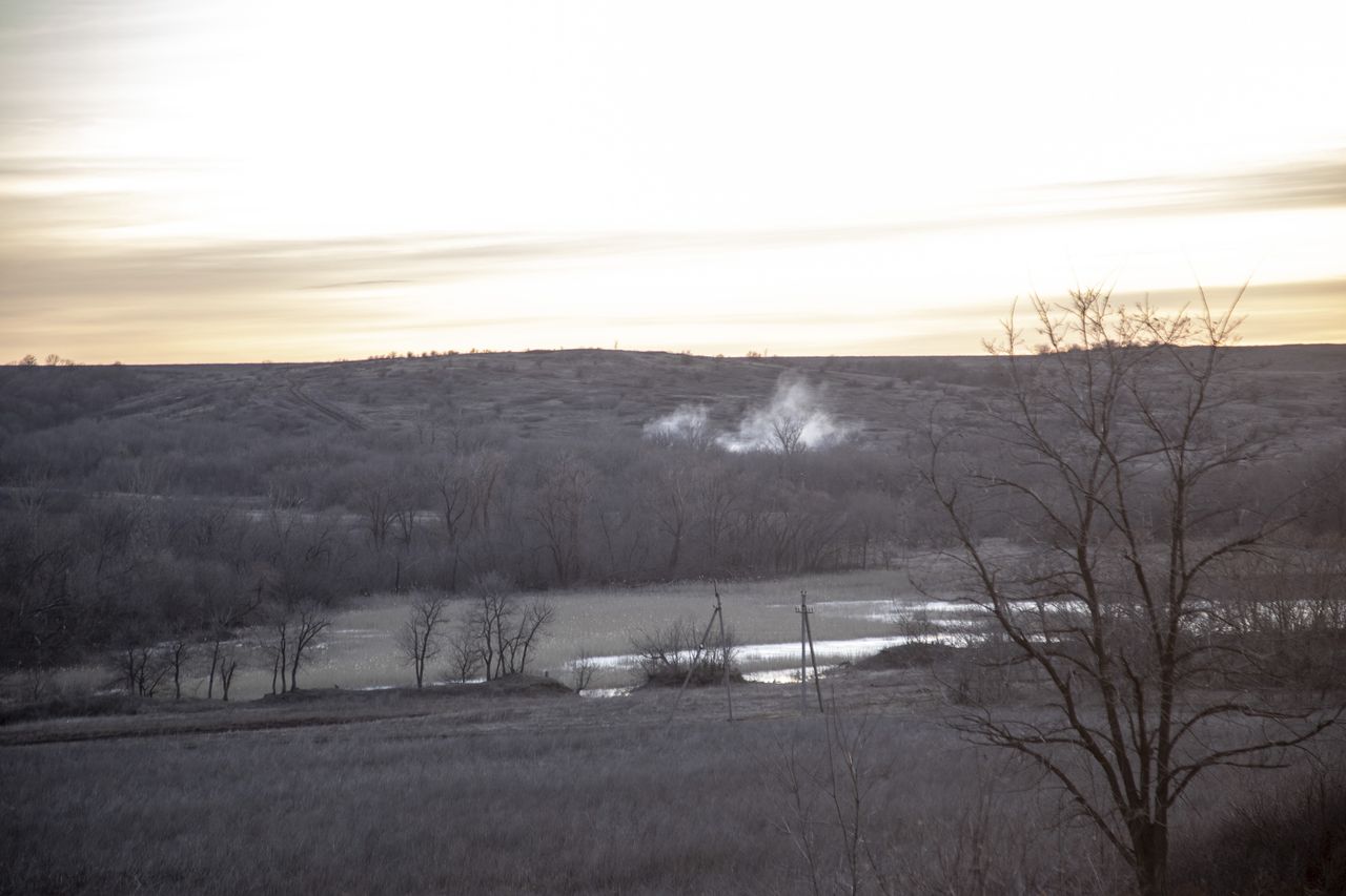 DONBAS, UKRAINE - FEBRUARY 24: Smoke rises from artillery shooting on the fields nearby Chasiv Yar battlefield as fighting between Ukrainian forces and Russian troops continues on the second year anniversary of the war in Donbas, Donetsk Oblast, Ukraine on February 24, 2024. (Photo by Narciso Contreras/Anadolu via Getty Images)