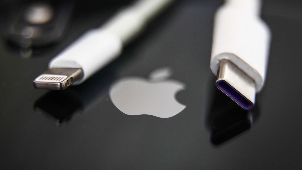 Lightning and USB-C cables are seen with Apple iPhone in this illustration photo taken in Krakow, Poland on September 25, 2021. (Photo by Jakub Porzycki/NurPhoto via Getty Images)