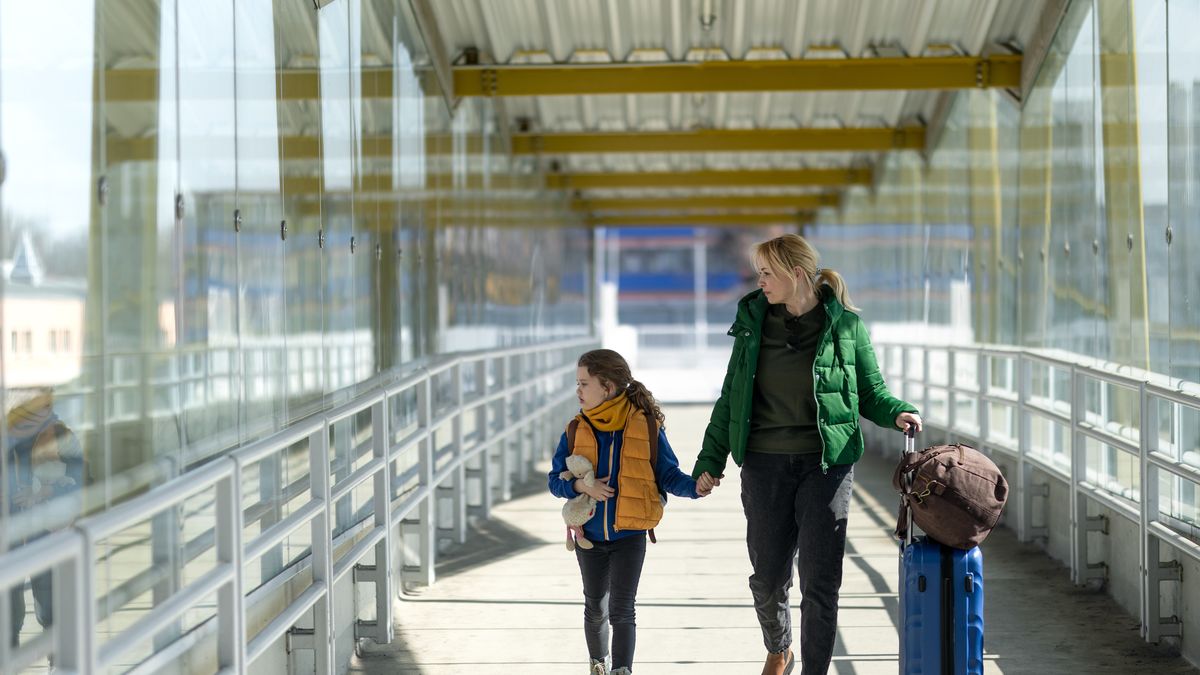 Ukraińscy imigranci walizka podróż