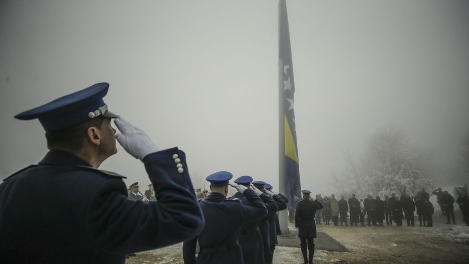 SARAJEVO, BOSNIA AND HERZEGOVINA - MARCH 01: Soldiers gather to attend a flag-hoisting ceremony at Hum Mountain during the "31st anniversary of Independence Day" in Sarajevo, Bosnia and Herzegovina on March 01, 2023. (Photo by SamÄ±r JordamovÄ±c/Anadolu Agency via Getty Images)