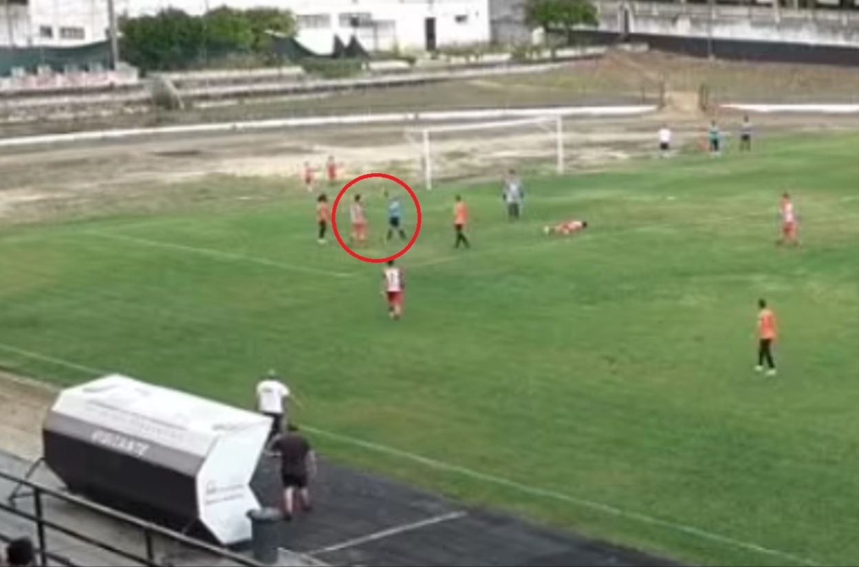 The referee showed the soccer player a white card.