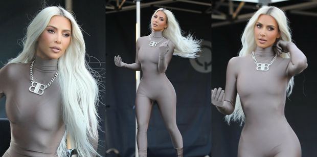 Kim Kardashian przechadza się po planie reklamy w dopasowanym kostiumie, eksponując zgrabną sylwetkę (ZDJĘCIA)