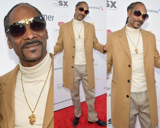 Elegancki Snoop Dogg ukrywa się za okularami ze złotą pszczołą