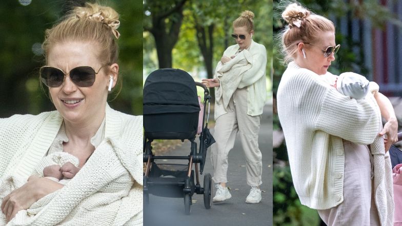 Freshly baked mother Paulina Chapko walks on your own with her toddler in the park (Photograph)