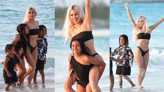 Kim Kardashian szaleje na plaży z gromadką pociech i wskakuje North na barana... (ZDJĘCIA)
