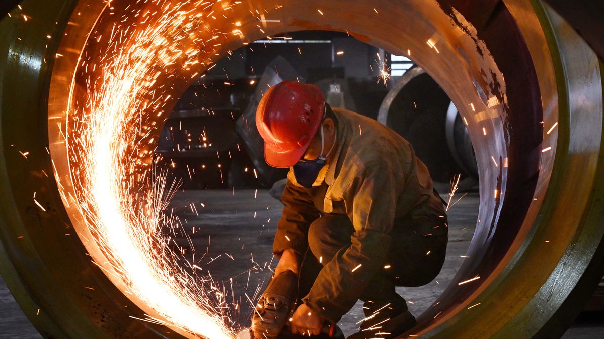 JINHUA, CHINA - FEBRUARY 26: A worker polishes steel at the polishing workshop of Zhejiang Wujing Machine Manufacture Co., Ltd. on February 26, 2024 in Jinhua, Zhejiang Province of China. (Photo by VCG/VCG via Getty Images)