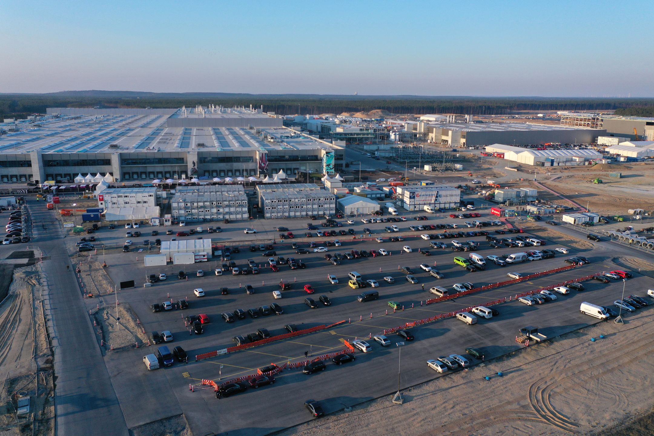 GRUENHEIDE, GERMANY - MARCH 21: In this aerial view the new Tesla Gigafactory electric car manufacturing plant stands on March 21, 2022 near Gruenheide, Germany. The new plant, officially called the Gigafactory Berlin-Brandenburg, will officially open tomorrow with an event with German Chancellor Olaf Scholz and Tesla CEO Elon Musk. The new plant is producing the Model Y as well as electric car batteries.  (Photo by Sean Gallup/Getty Images)