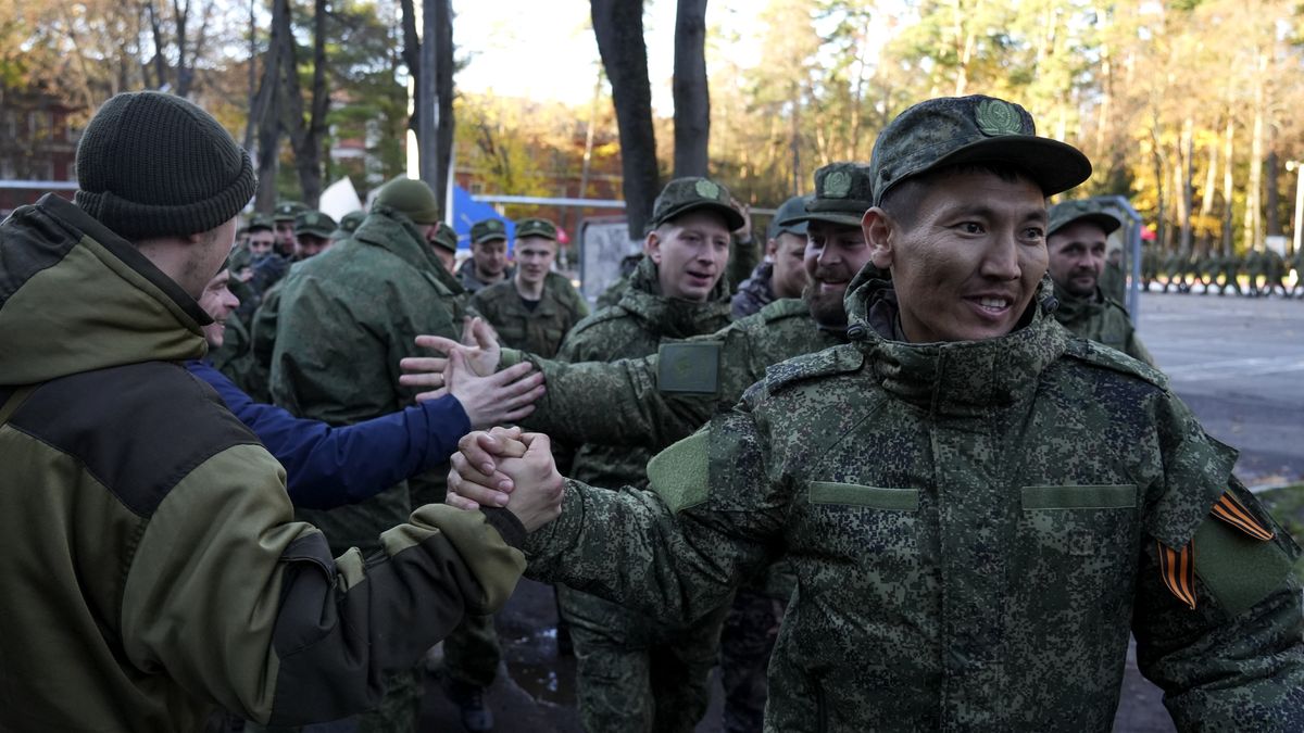MOSCOW, RUSSIA - OCTOBER 10: Russian citizens drafted during the partial mobilization are seen being dispatched to combat coordination areas after a military call-up for the Russia-Ukraine war in Moscow, Russia on October 10, 2022. (Photo by Stringer/Anadolu Agency via Getty Images)