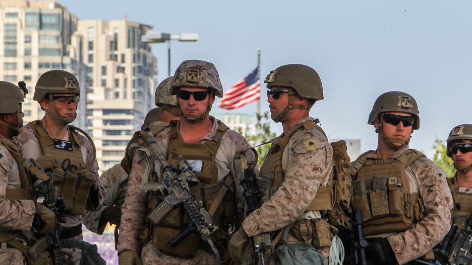 LOS ANGELES, CALIFORNIA - JUNE 13: US Marine stand guard at the entrance of the Wilshire Federal Building on June 13, 2025, in Los Angeles, California. A federal appeals court ruled on June 12 that the Trump administration can maintain control of the California National Guard, overturning a lower court ruling that U.S. President Donald Trump's deployment of troops to Los Angeles without Governor Gavin Newsom's consent as unlawful. (Photo by Apu Gomes/Getty Images)