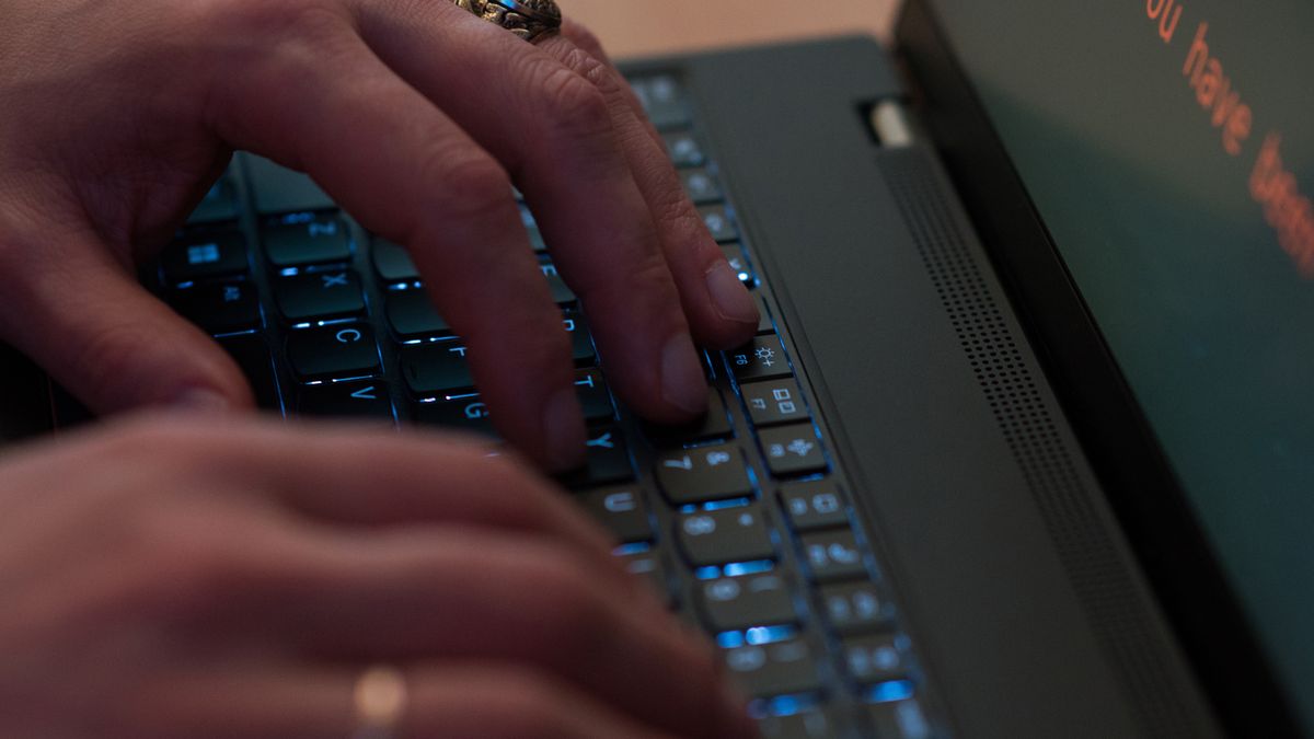 A participant works on their laptop during the Locked Shields exercise in Tallinn, Estonia, on Tuesday, April 23, 2024. The NATO Cooperative Cyber Defense Center of Excellence said the annual event is intended to boost the skills of cybersecurity experts defending national IT systems and critical infrastructure under real-time attacks. Photographer: Peter Kollanyi/Bloomberg via Getty Images