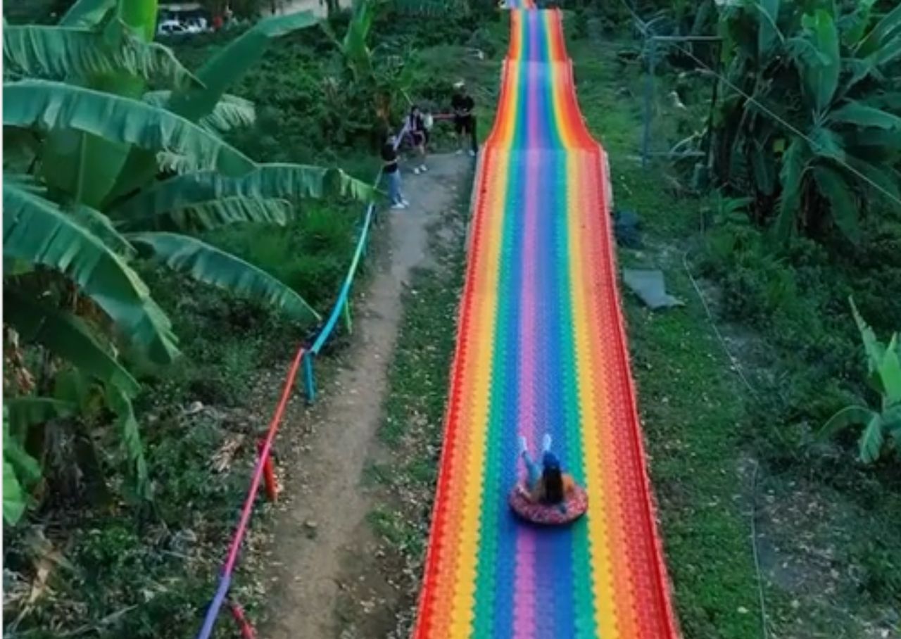 Colombia's rainbow waterslide: The world's longest plastic slide takes internet by storm