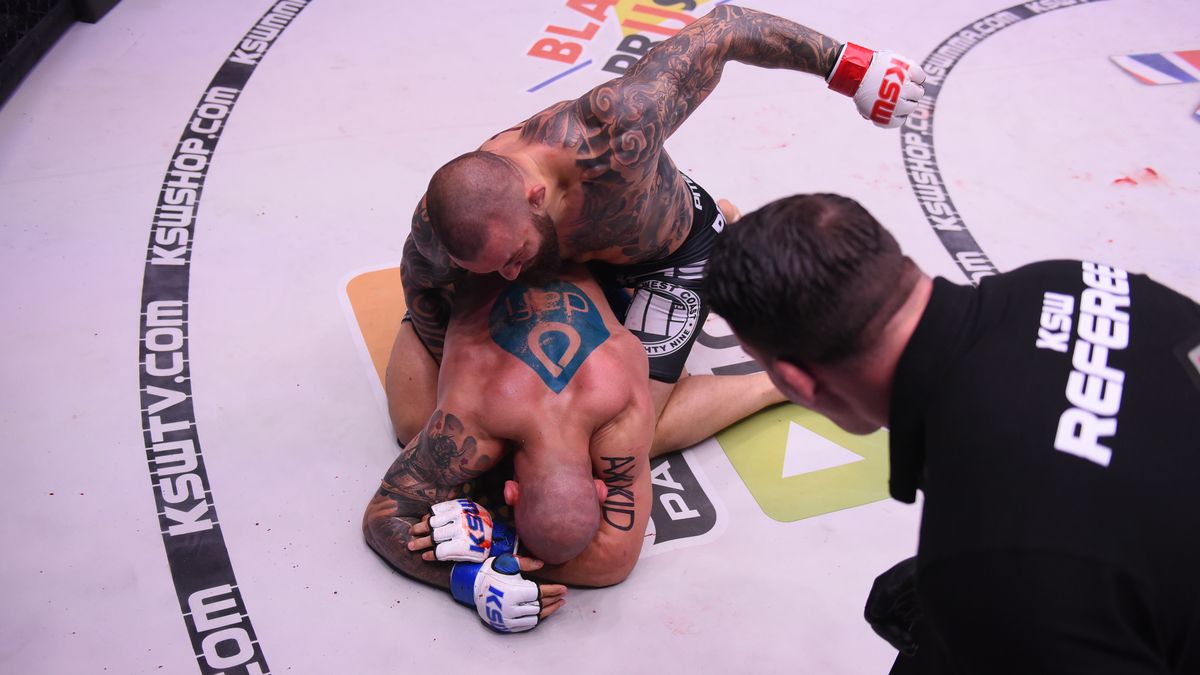 Michał Materla w walce z Damianem Janikowskim na KSW 45