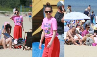 Paulina Sykut-Jeżyna z mężem i córką uskuteczniają "plażing" w Sopocie. Pozbawioną makijażu twarz zasłoniły okulary (ZDJĘCIA)