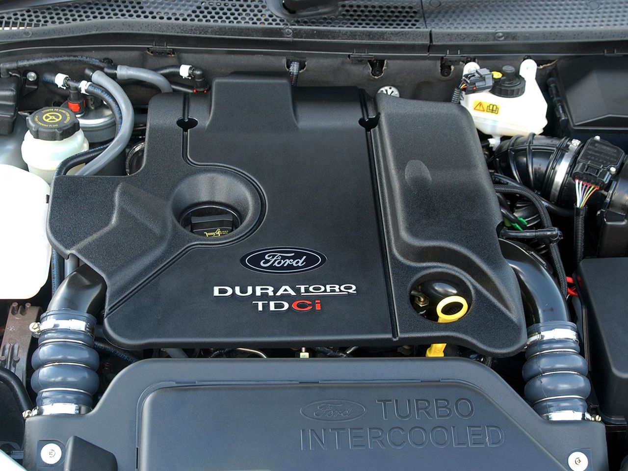 Motor 1.8 TDCi to niezbyt ekonomiczny, dynamiczny i "czysty" silnik tego producenta, ale jeden z najtańszych w eksploatacji i trwały. Jednocześnie ostatni autorski, udany motor wysokoprężny Forda w samochodzie osobowym. Nie bierzemy pod uwagę najnowszego 1.5 TDCi