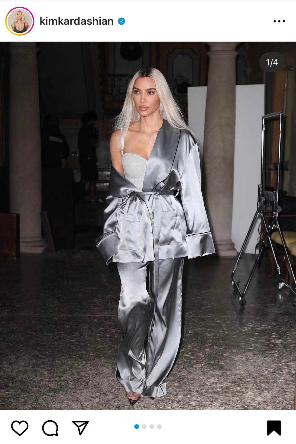 Kim Kardashian in a silver satin outfit